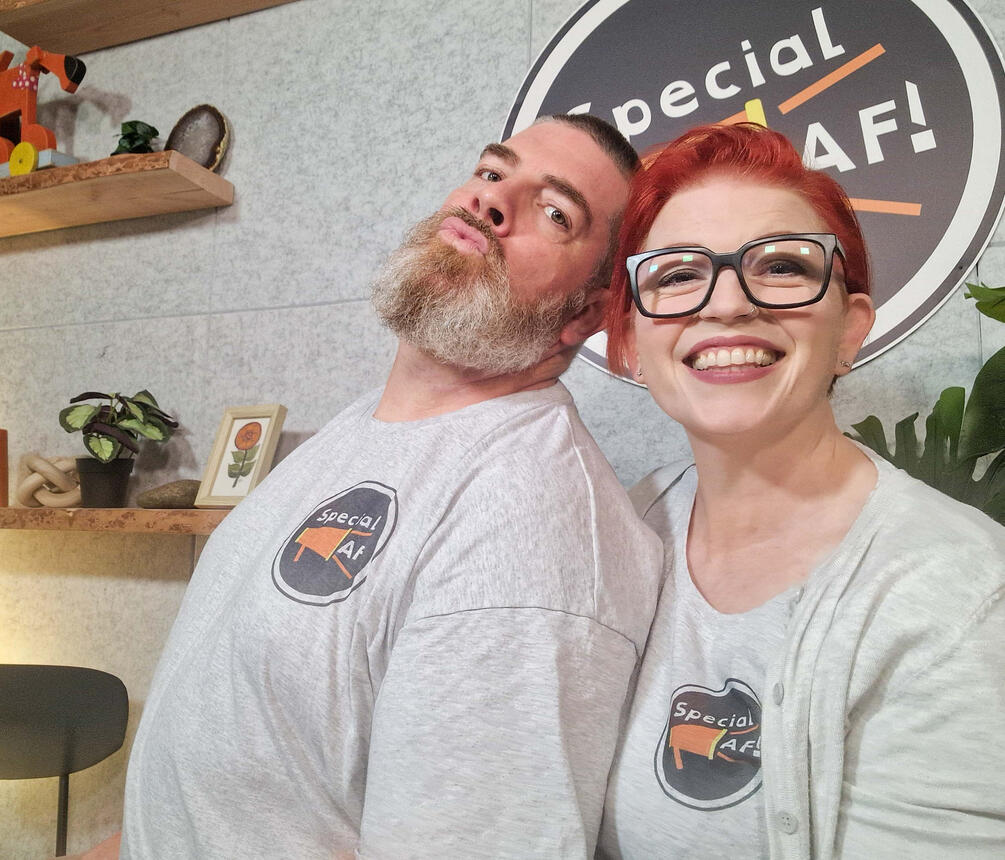 Lann and Lydia, Lann is doing his best kissy face, and Lydia is laughing